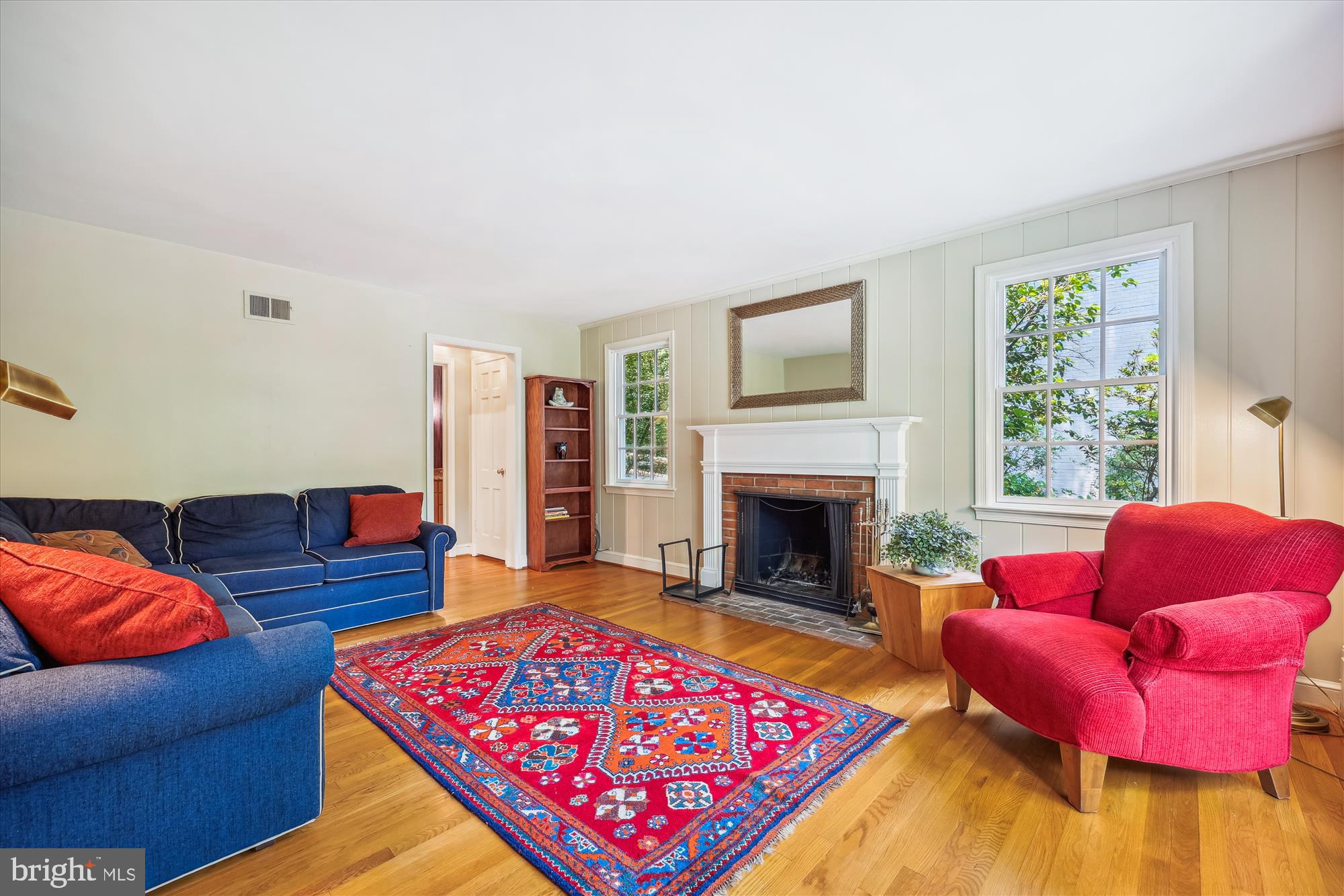 7212 Old Gate Road Rockville, MD 20852 - Photo 5 of 50 a living room with furniture and a fireplace