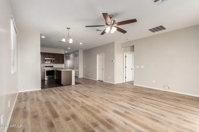 a view of a kitchen with a sink and dishwasher