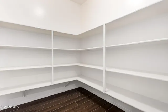 a storage room with wooden floor