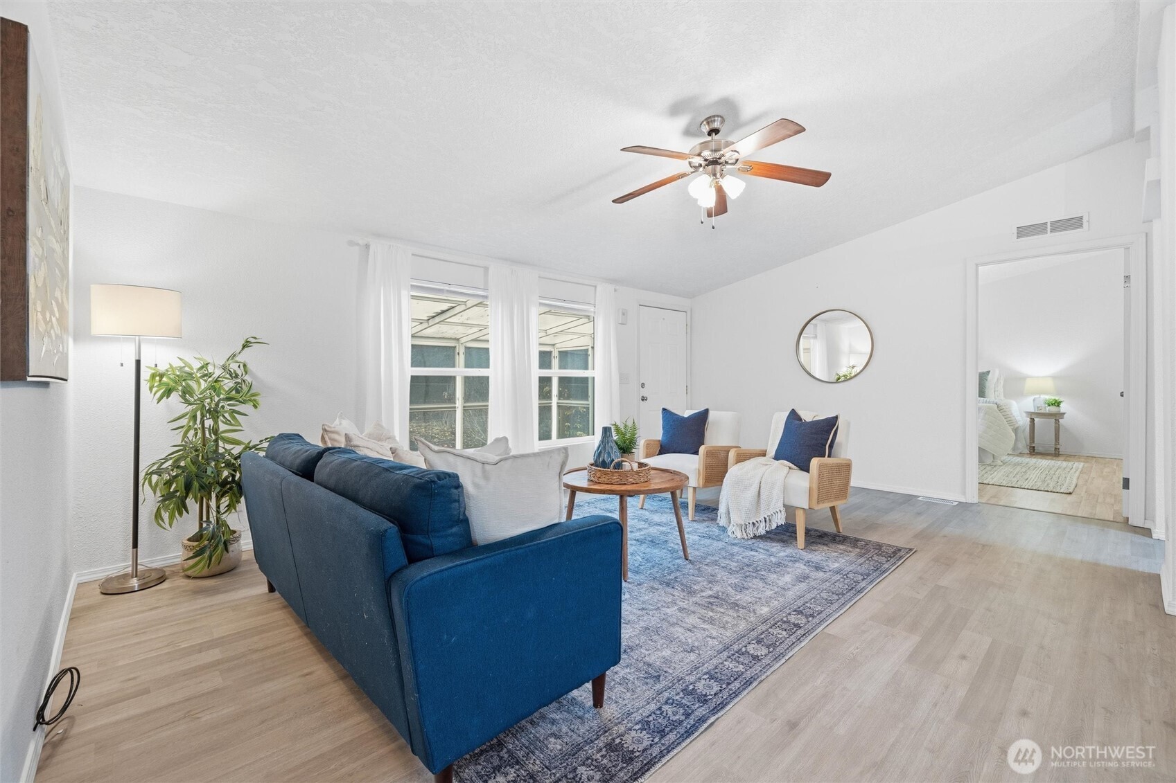 579 Lupine Lane, Unit 16 Burlington, WA 98233 - Photo 14 of 37 a living room with furniture and a large window