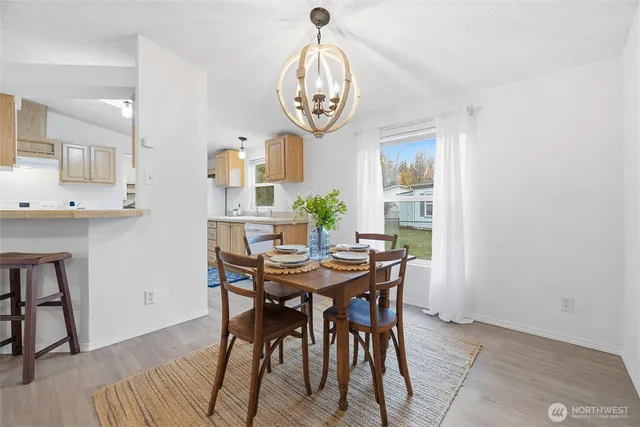 a view of a dining room with furniture