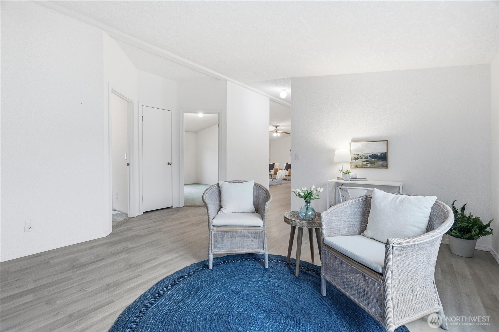 579 Lupine Lane, Unit 16 Burlington, WA 98233 - Photo 28 of 37 a living room with furniture and wooden floor