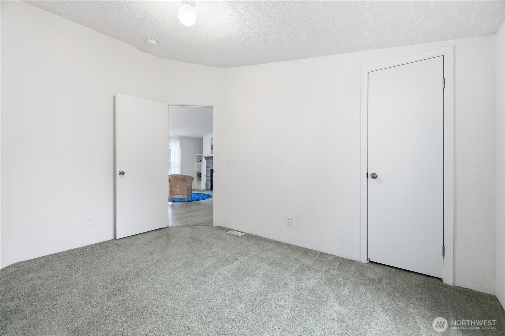 579 Lupine Lane, Unit 16 Burlington, WA 98233 - Photo 32 of 37 an empty room with an entrance