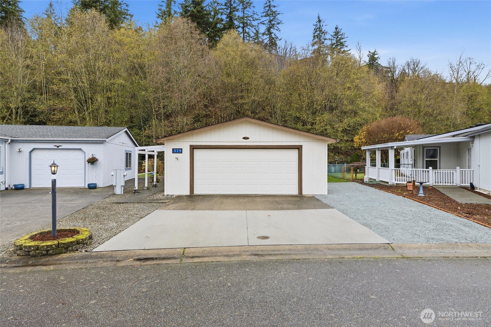 579 Lupine Lane, Unit 16 Burlington, WA 98233 - Photo 37 of 37 a front view of a house with a yard and garage