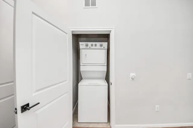 a utility room with a washer and dryer