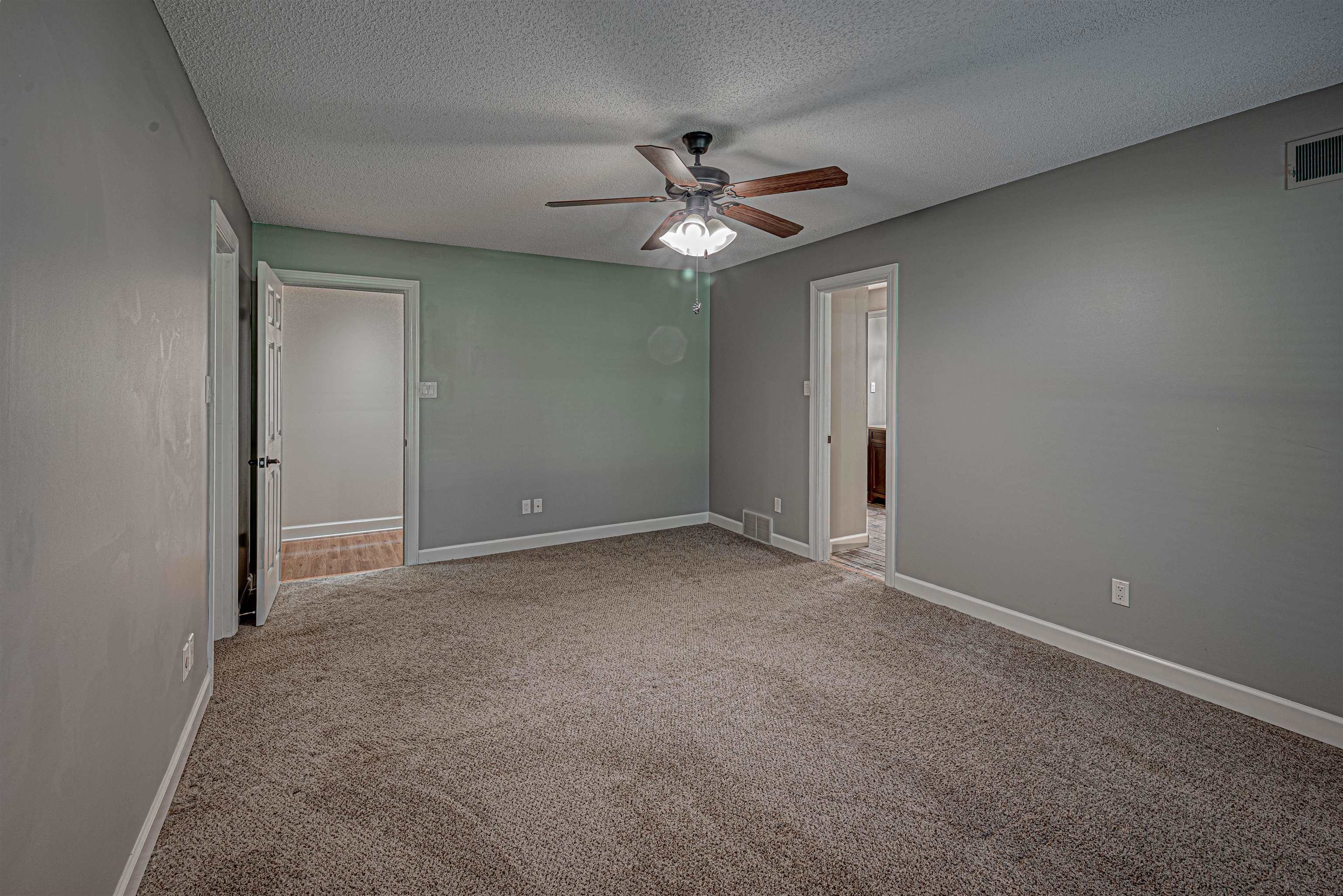 710 Poplar Acres Road Piperton, TN 38017 - Photo 14 of 24 Large second bedroom with attached full bath. The bath also has hall access.