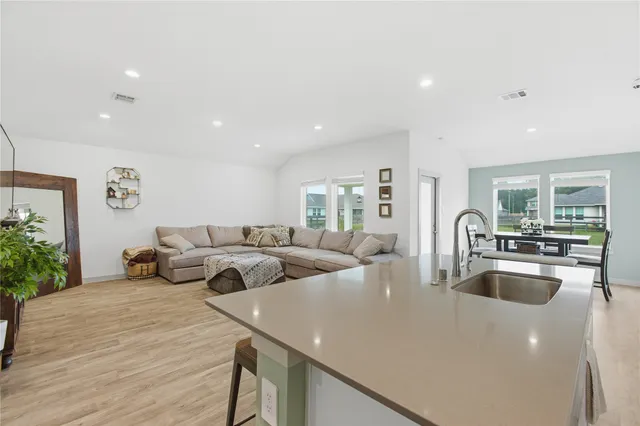 a living room with furniture and a table