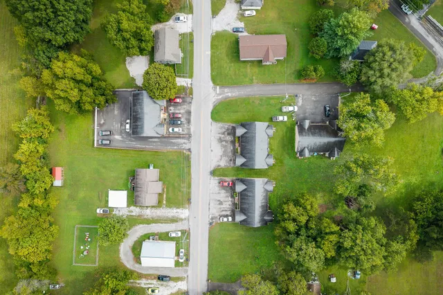 a view of kitchen with cabinets and wooden floor