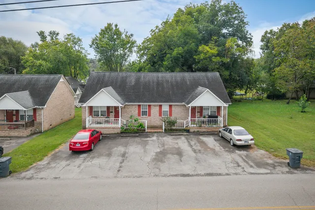 an aerial view of a house with a garden