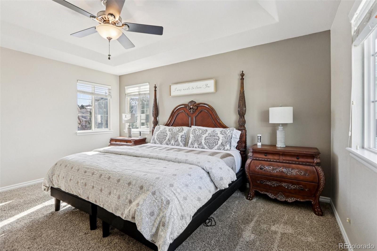 3120 Redhaven Way Highlands Ranch, CO 80126 - Photo 20 of 50 a bedroom with a bed dresser and a window