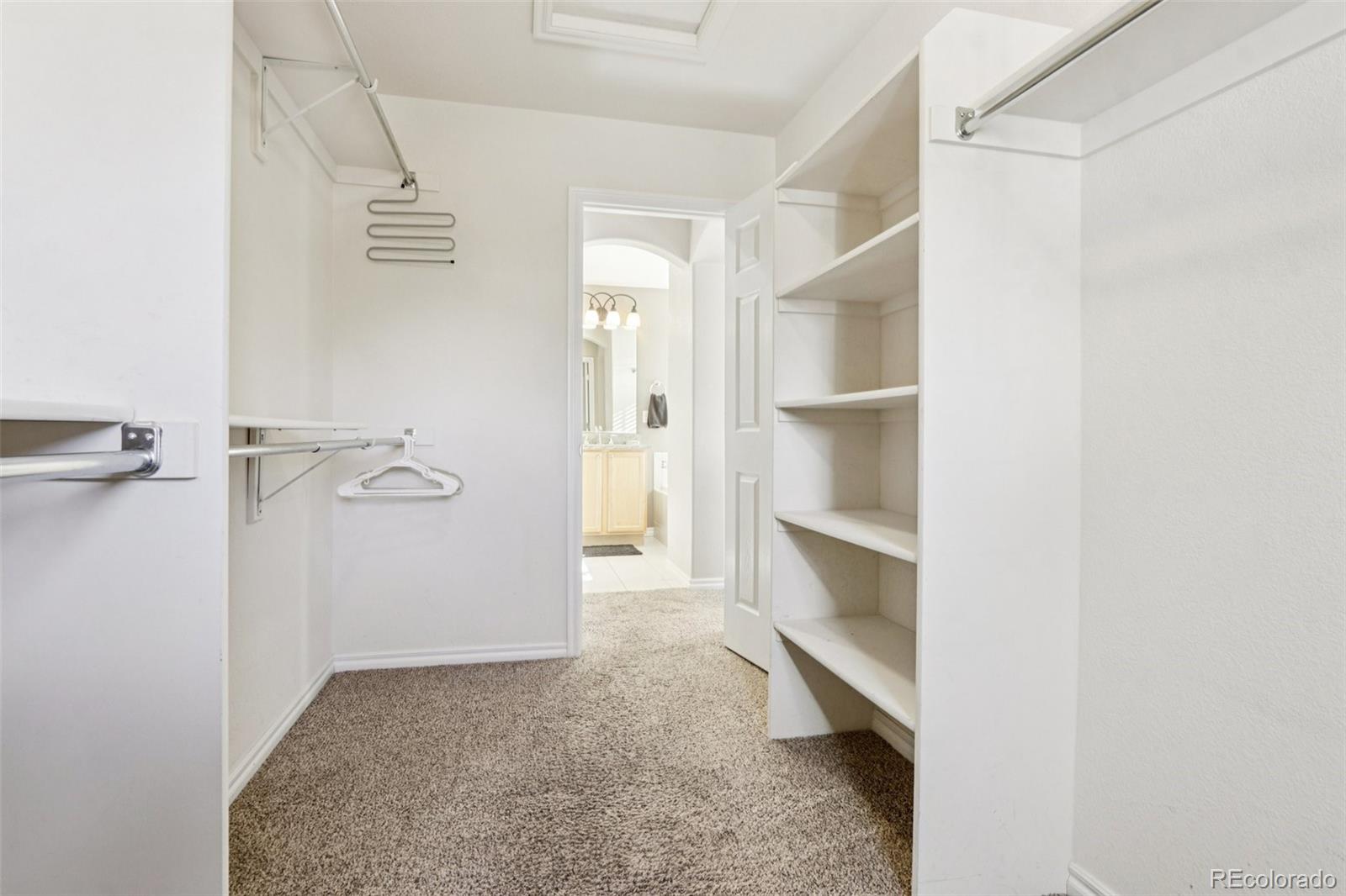 3120 Redhaven Way Highlands Ranch, CO 80126 - Photo 36 of 50 a view of an empty walk in closet