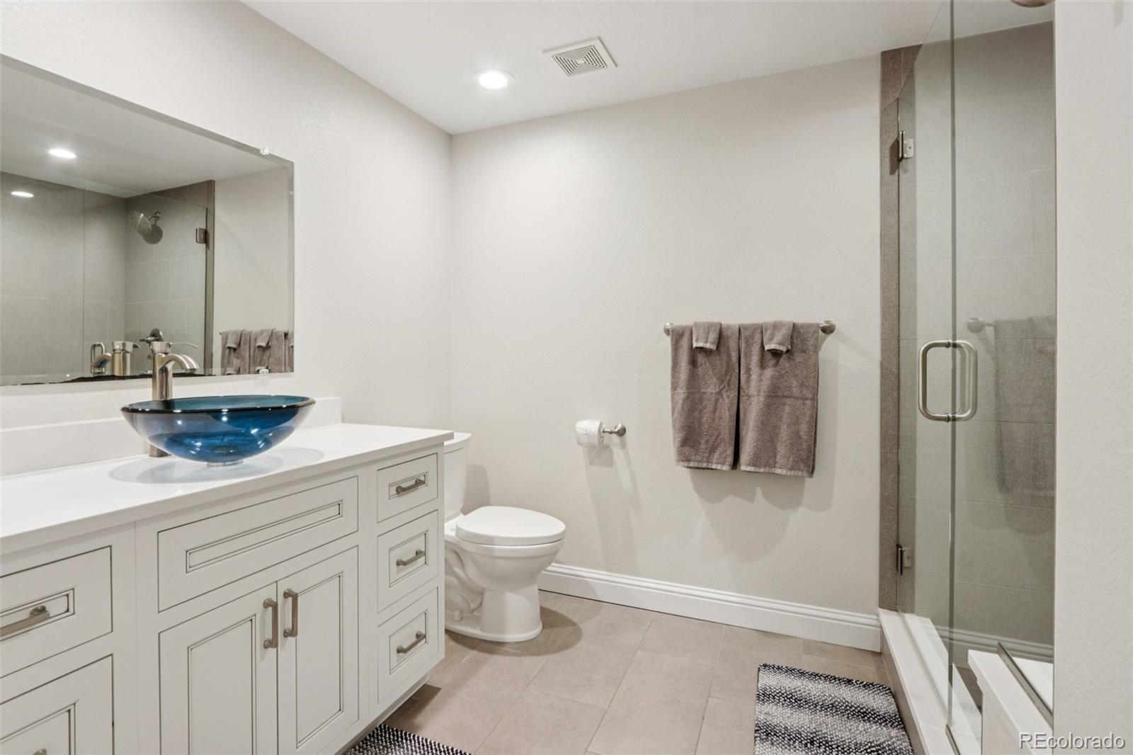 3120 Redhaven Way Highlands Ranch, CO 80126 - Photo 40 of 50 a bathroom with a sink toilet and shower