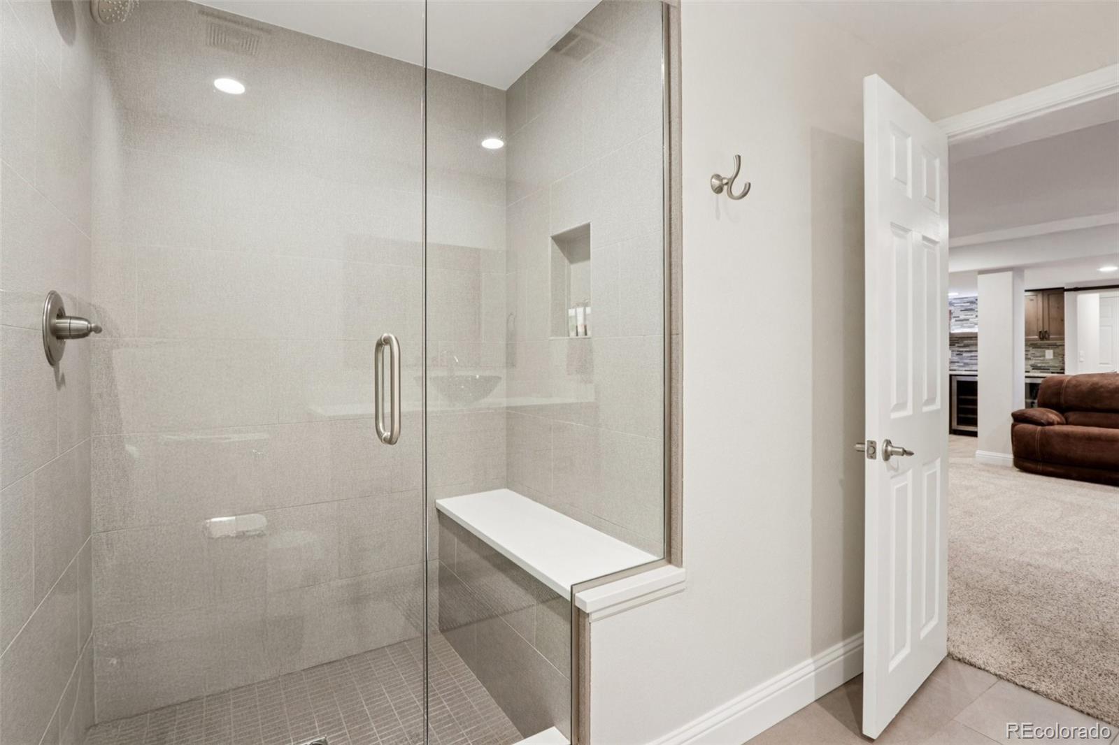 3120 Redhaven Way Highlands Ranch, CO 80126 - Photo 41 of 50 a bathroom with a sink and mirror