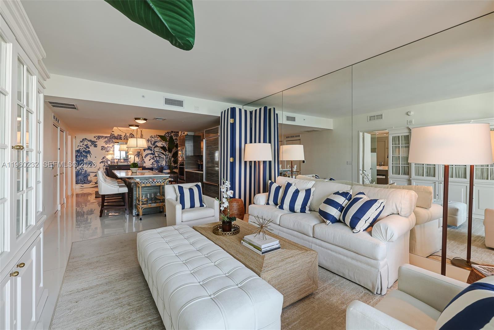 460 Northeast 28th Street, Unit 704 Miami, FL 33137 - Photo 11 of 53 a living room with furniture and a large window