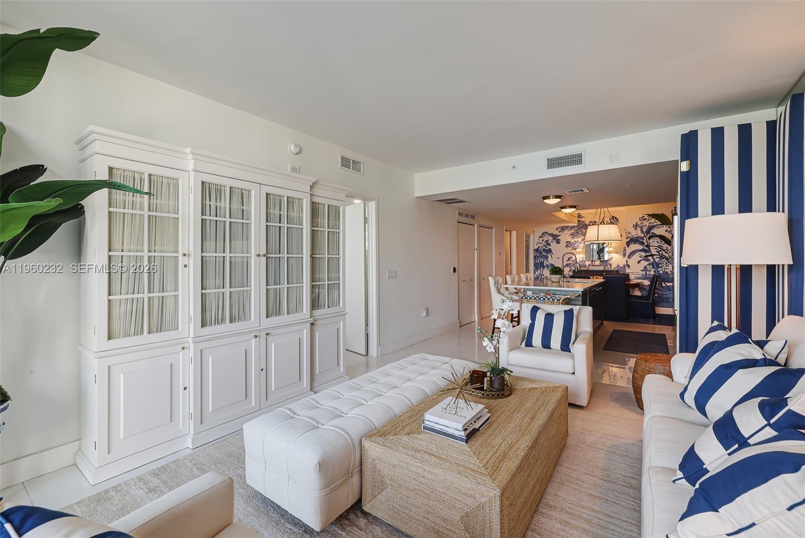 460 Northeast 28th Street, Unit 704 Miami, FL 33137 - Photo 12 of 53 a living room with furniture and a window