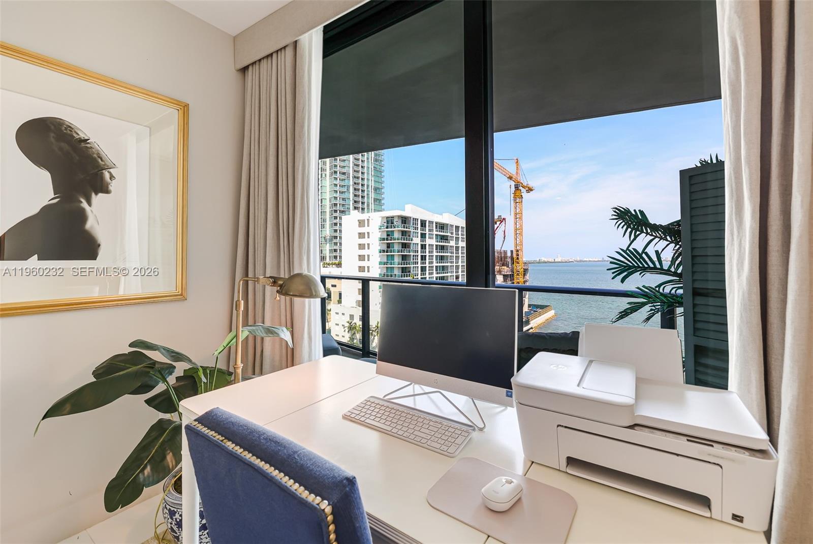 460 Northeast 28th Street, Unit 704 Miami, FL 33137 - Photo 28 of 53 a living room with furniture and window