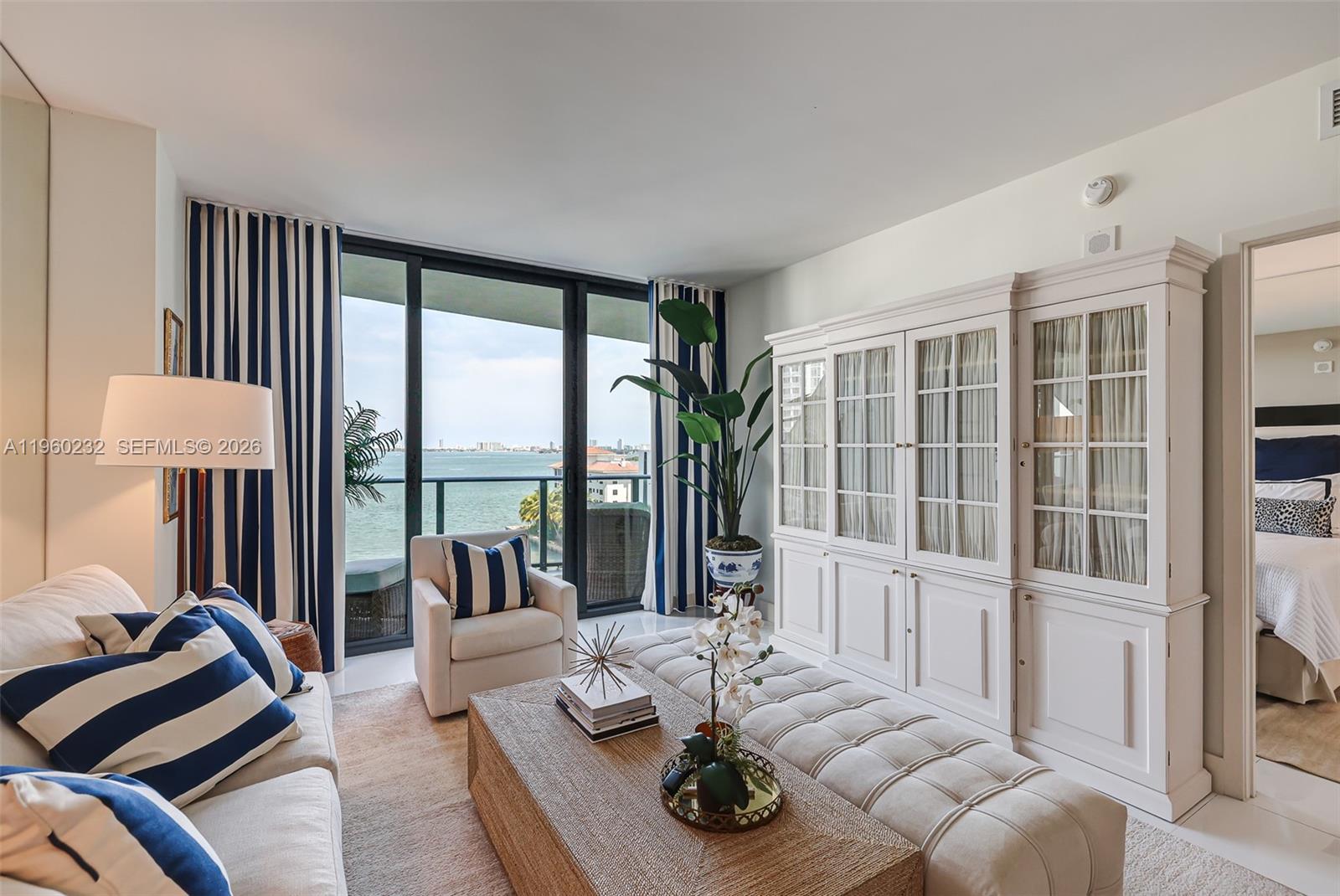 460 Northeast 28th Street, Unit 704 Miami, FL 33137 - Photo 3 of 53 a living room with furniture and a large window