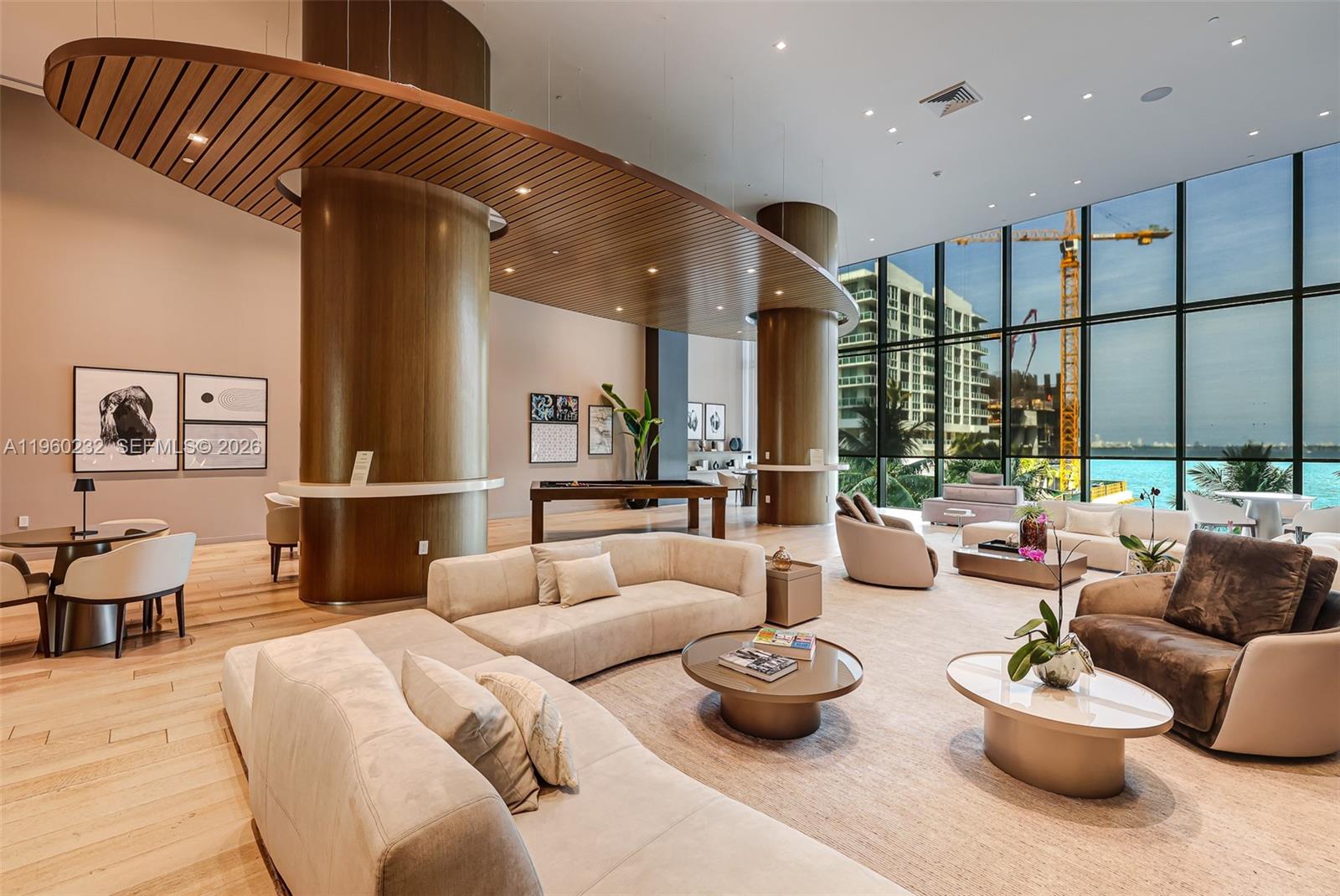 460 Northeast 28th Street, Unit 704 Miami, FL 33137 - Photo 40 of 53 a living room with furniture and a potted plant