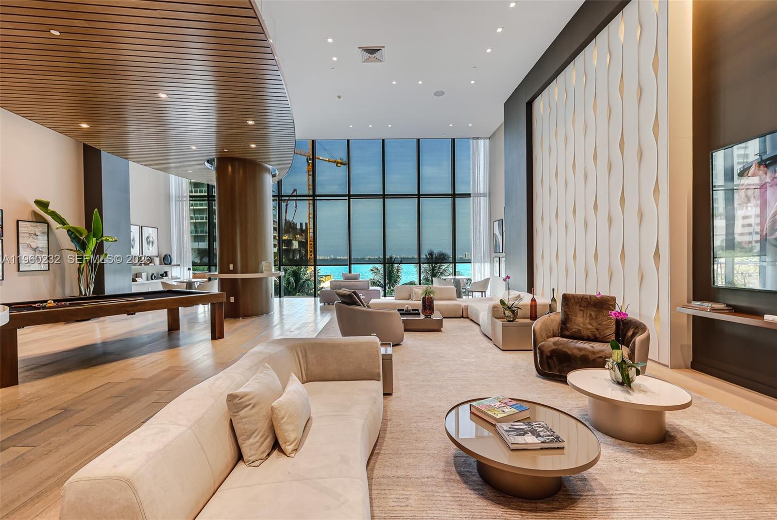 460 Northeast 28th Street, Unit 704 Miami, FL 33137 - Photo 41 of 53 a living room with furniture and a large window