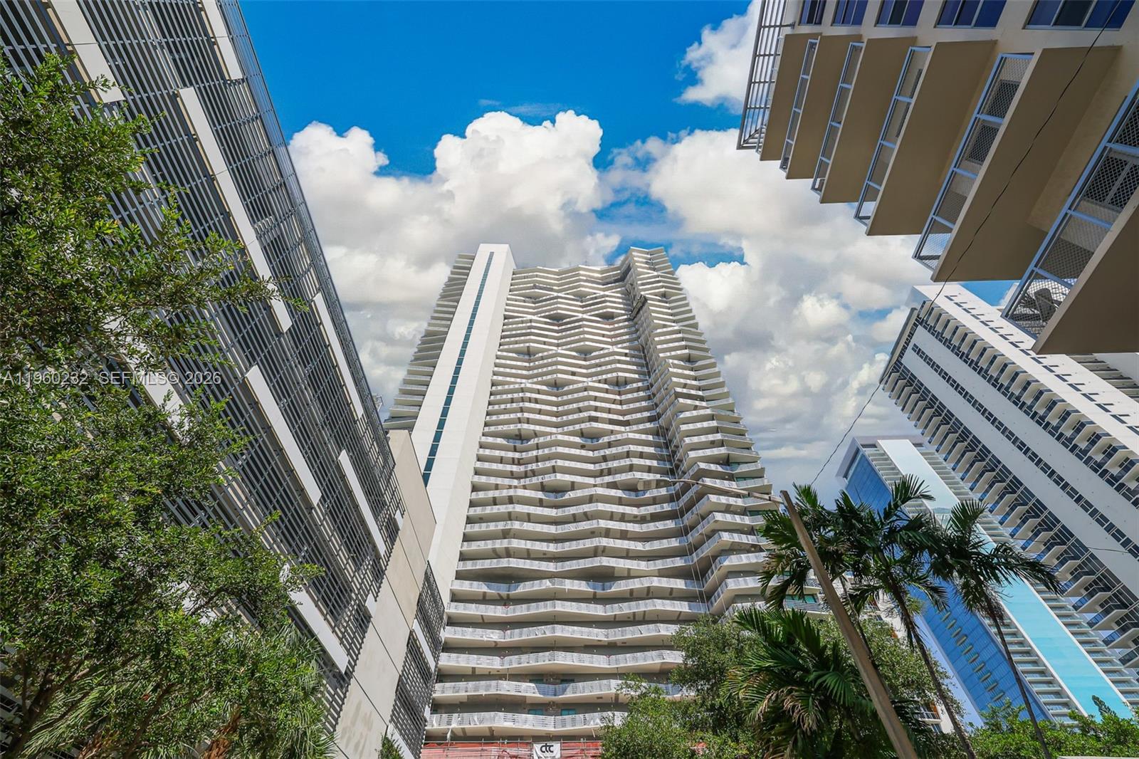 460 Northeast 28th Street, Unit 704 Miami, FL 33137 - Photo 52 of 53 a view of a balcony with chairs