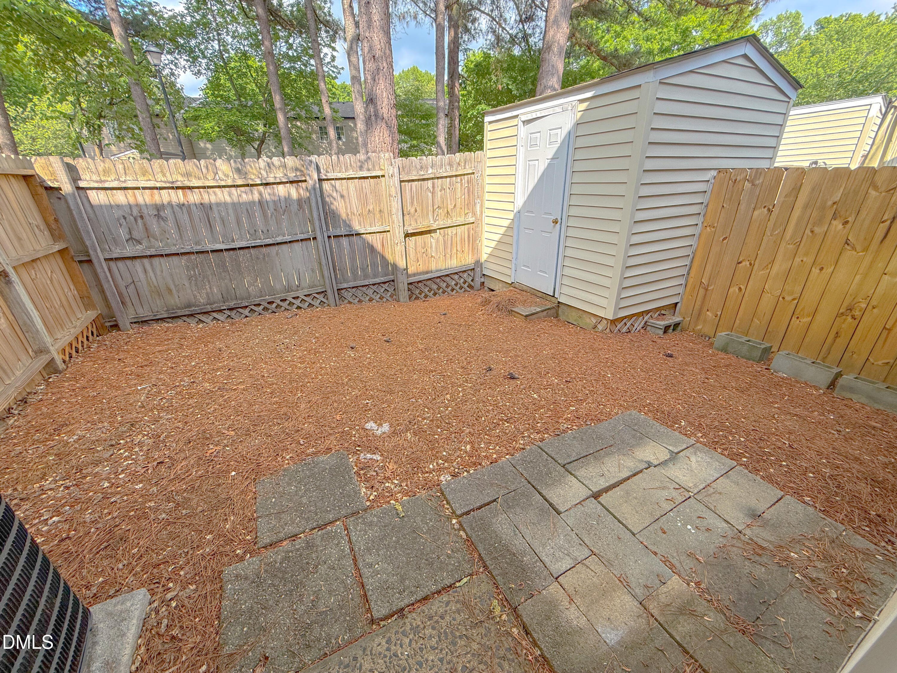 7718 Kelley Court Raleigh, NC 27615 - Photo 13 of 13 a backyard of a house