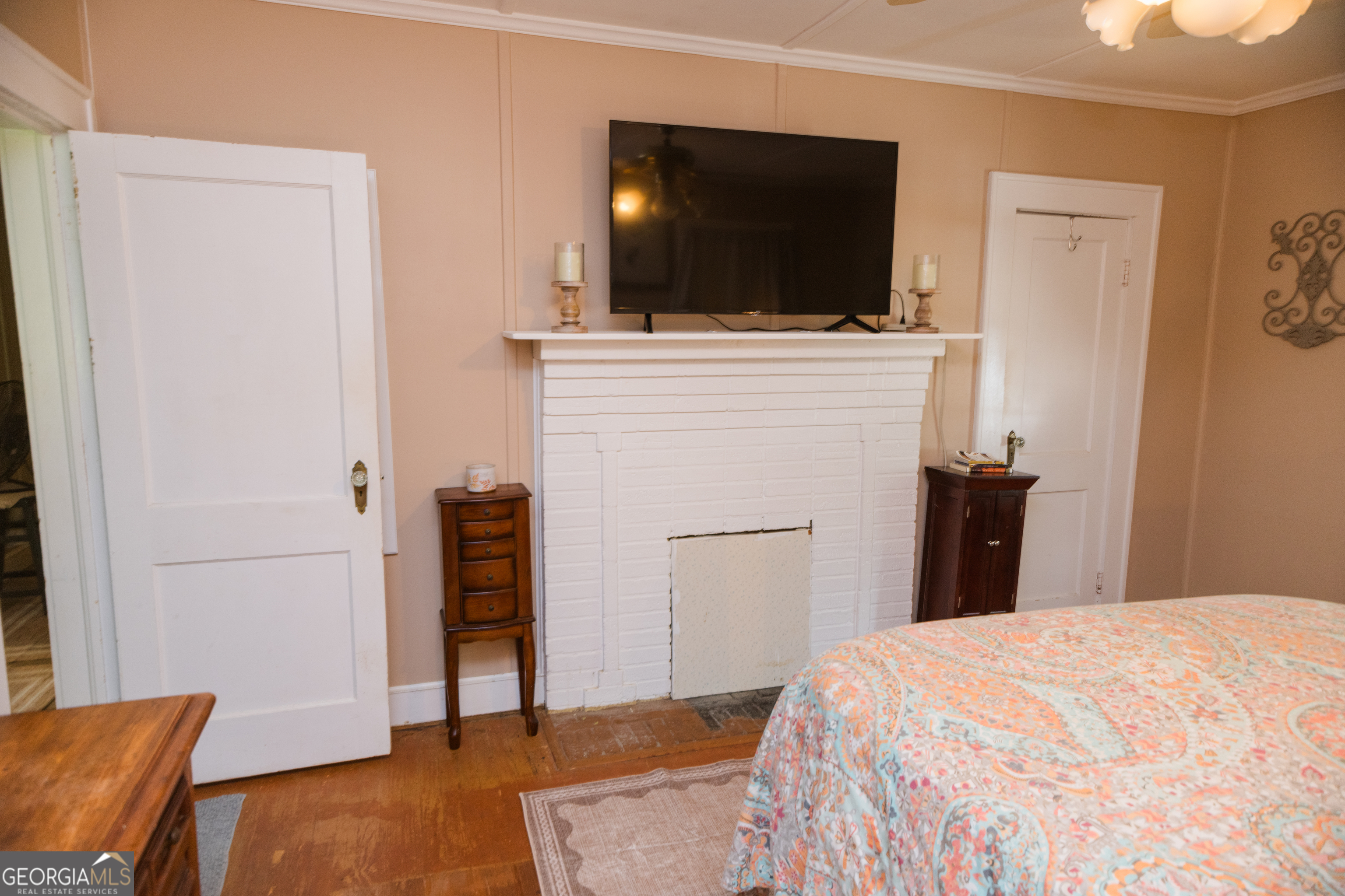348 Americus Highway Butler, GA 31006 - Photo 36 of 59 a bedroom with a bed and a flat screen tv