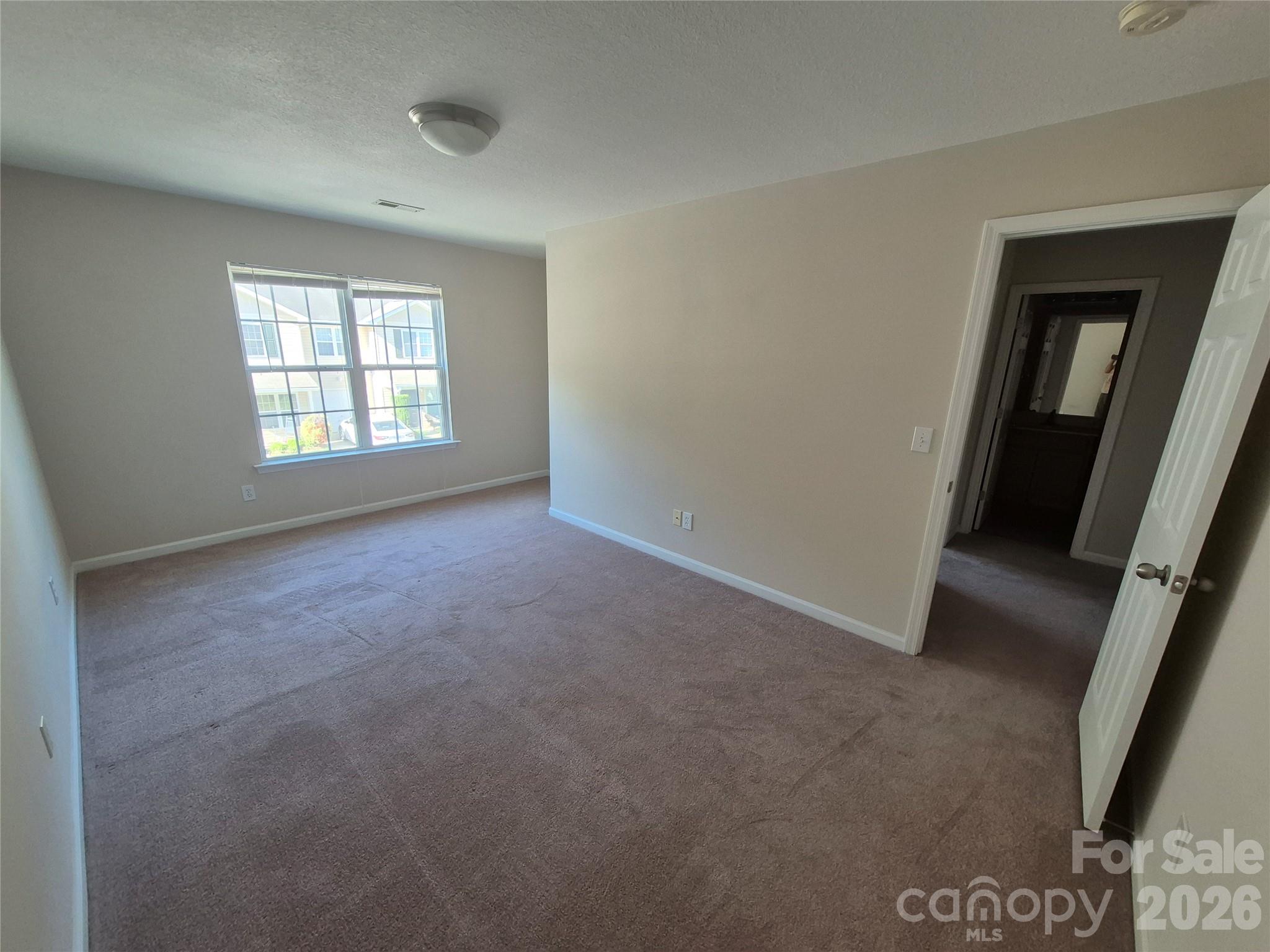149 Alpine Ridge Drive Asheville, NC 28803 - Photo 13 of 15 a view of empty room with window