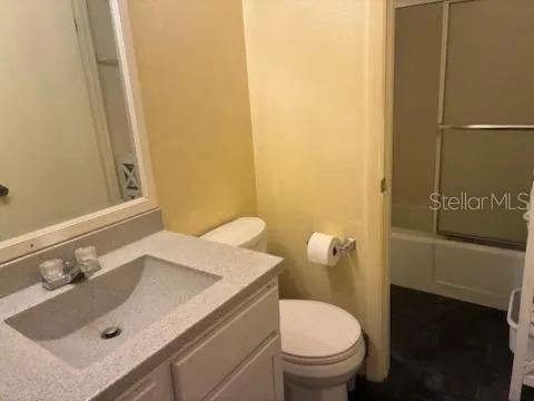 a bathroom with a sink and a toilet