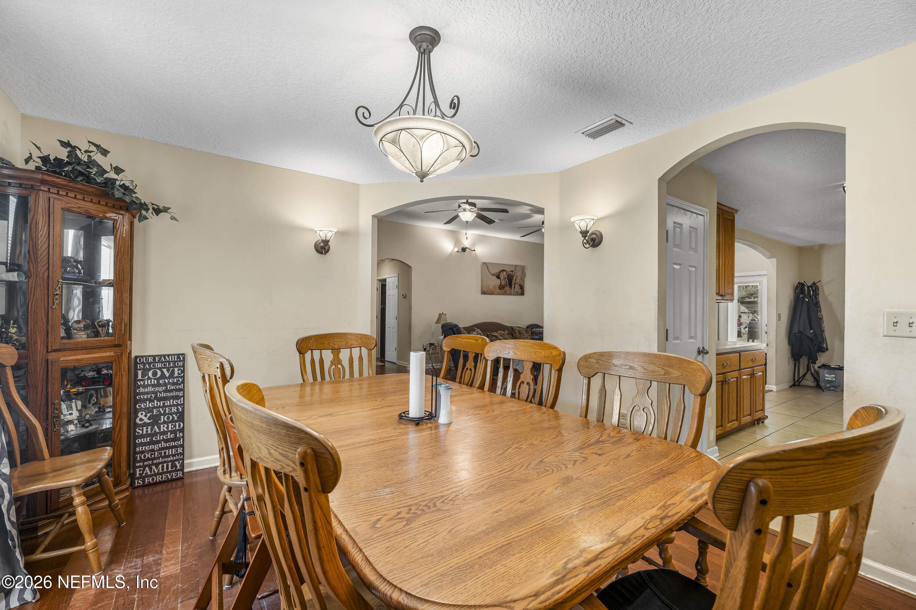 1725 Davidson Farm Road Jacksonville, FL 32218 - Photo 22 of 55 a view of a dining room with furniture