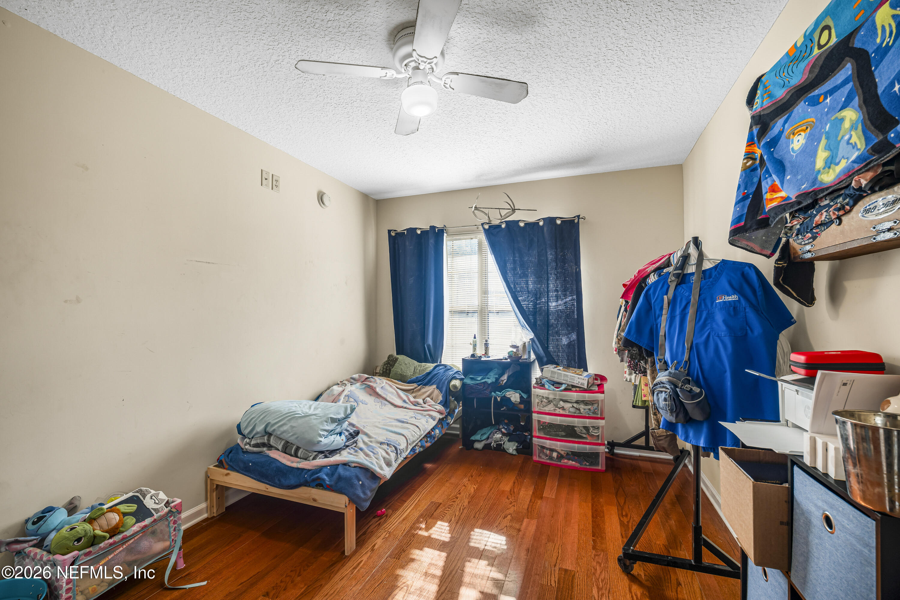 1725 Davidson Farm Road Jacksonville, FL 32218 - Photo 42 of 55 a bedroom with furniture and a window