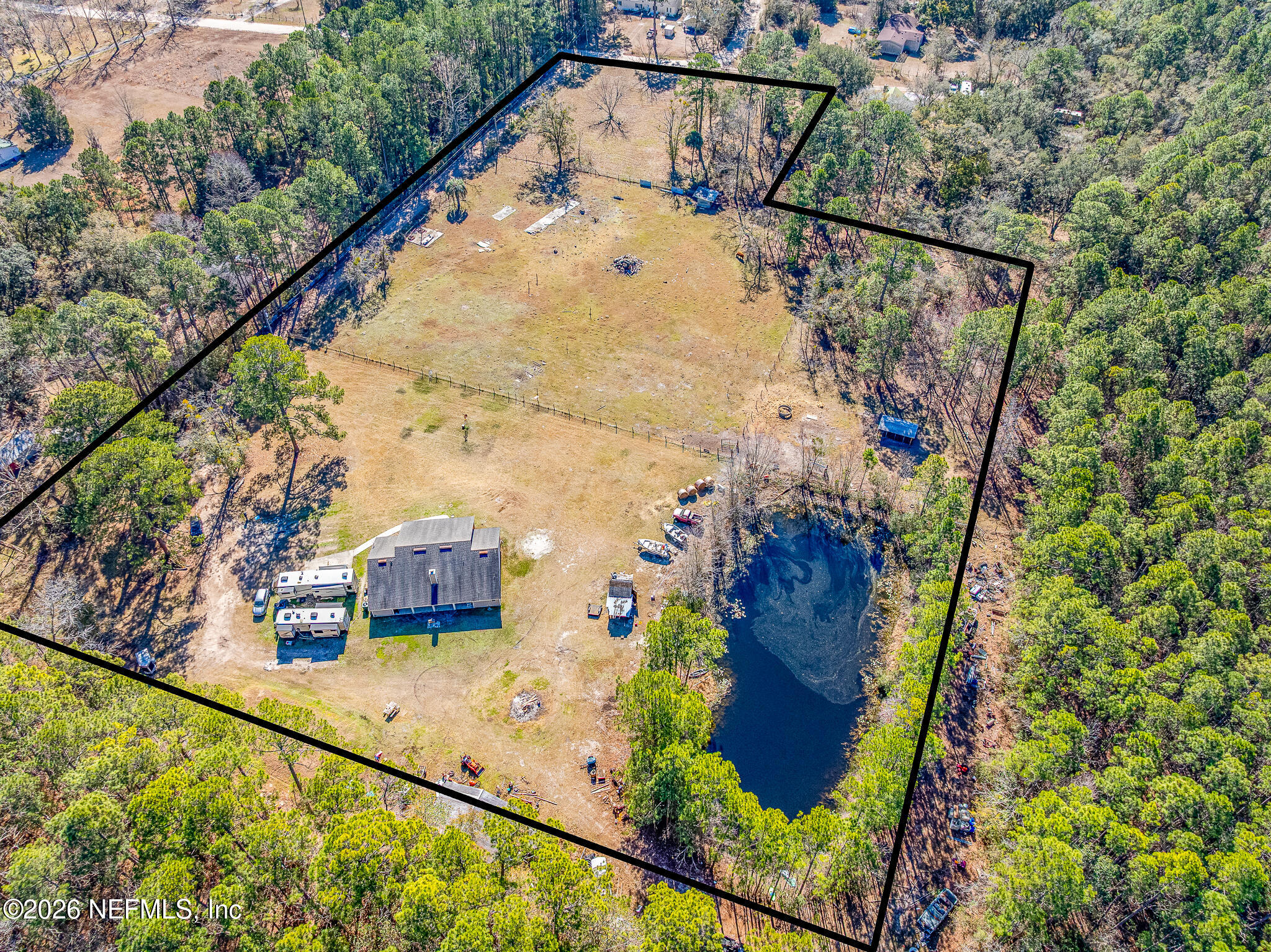 1725 Davidson Farm Road Jacksonville, FL 32218 - Photo 8 of 55 a view of swimming pool with a yard and sitting area