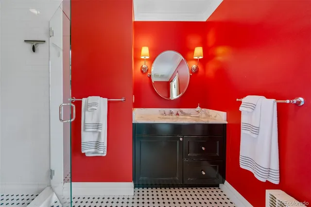 a bathroom with a sink and a mirror