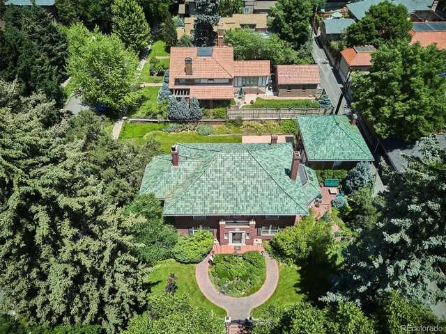 an aerial view of a house having yard