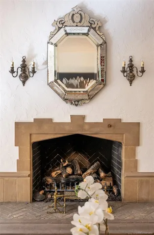 a view of fireplace and wooden floor