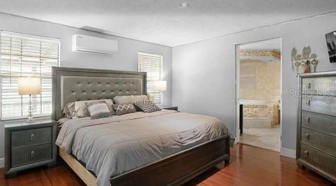 5717 Southwest County Rd Lake Lake Butler, FL 32054 - Photo 11 of 19 a bedroom with a bed and a cabinets