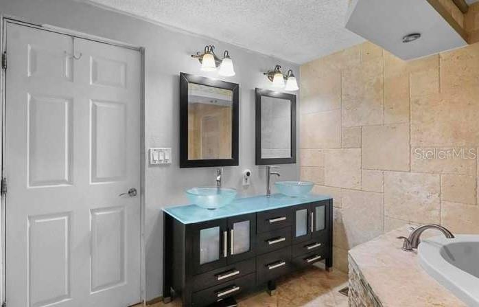 5717 Southwest County Rd Lake Lake Butler, FL 32054 - Photo 12 of 19 a bathroom with a sink double vanity and a mirror