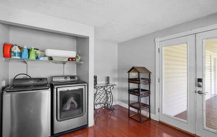 5717 Southwest County Rd Lake Lake Butler, FL 32054 - Photo 16 of 19 a view of a livingroom with washer and dryer