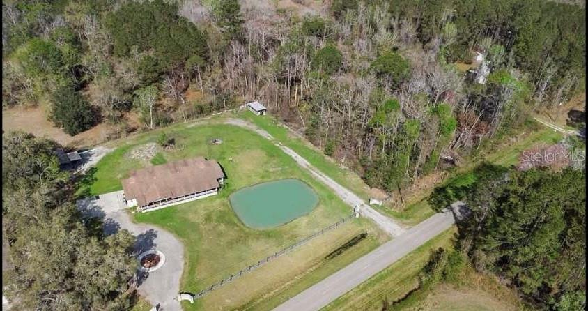 5717 Southwest County Rd Lake Lake Butler, FL 32054 - Photo 19 of 19 an aerial view of a residential houses with outdoor space