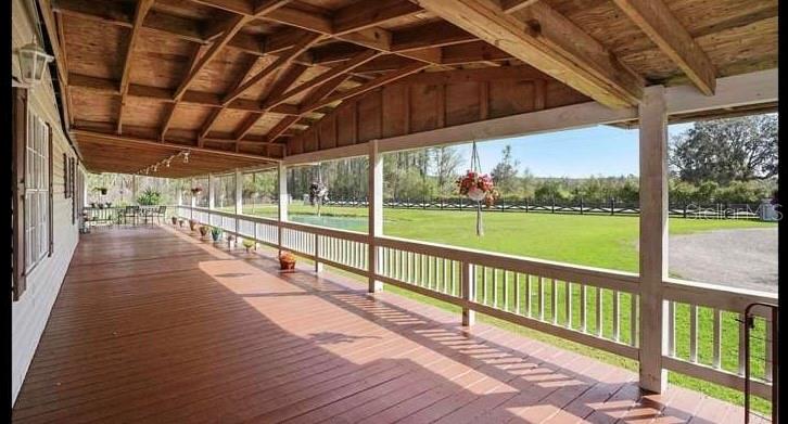 5717 Southwest County Rd Lake Lake Butler, FL 32054 - Photo 4 of 19 a view of porch with a backyard