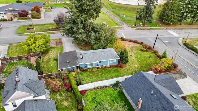 an aerial view of a house with a garden