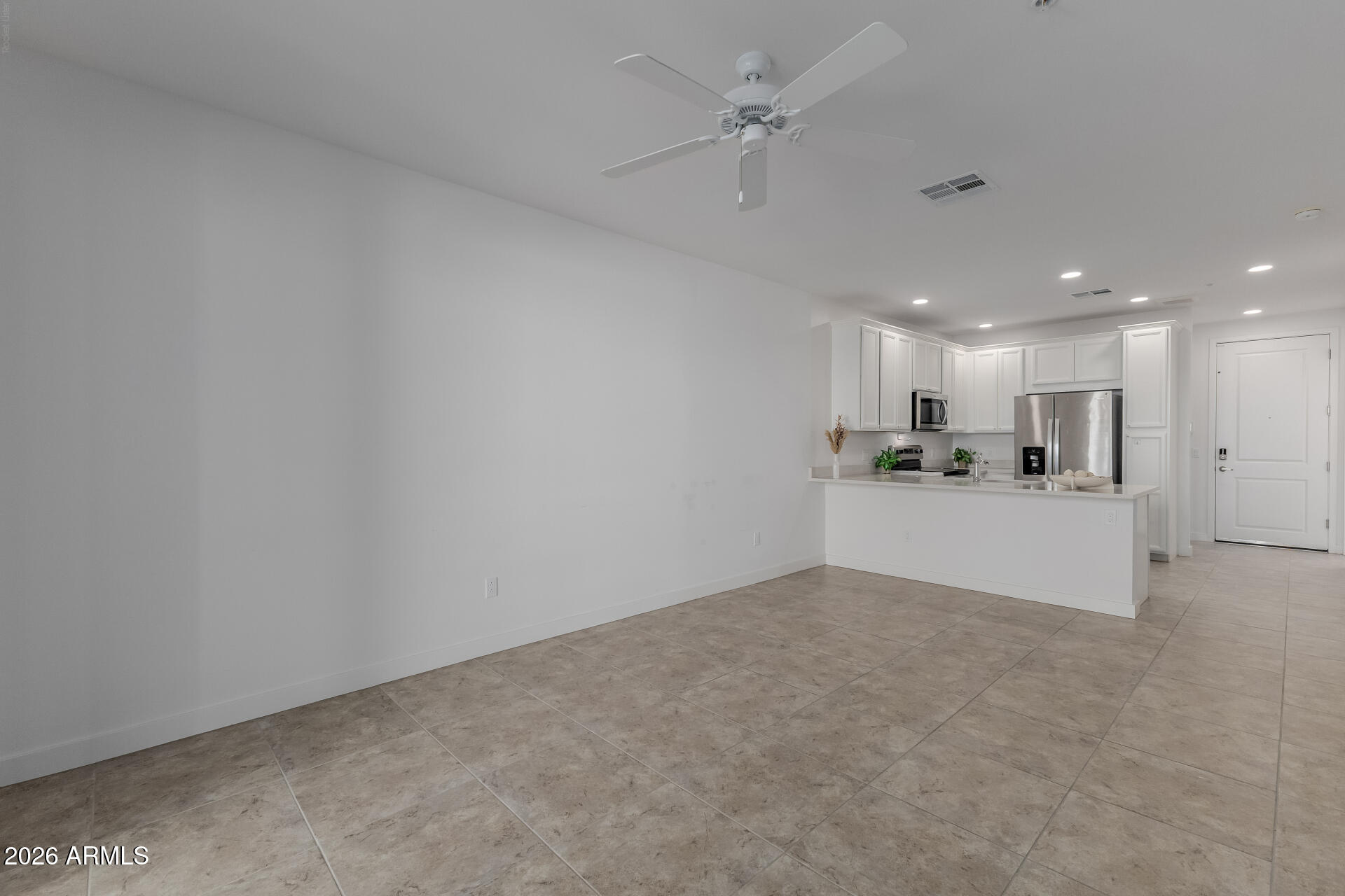 2511 West Queen Creek Road, Unit 279 Chandler, AZ 85248 - Photo 5 of 35 a view of a kitchen with a sink and cabinets