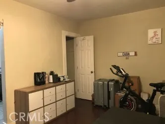 a living room with couches and painted walls