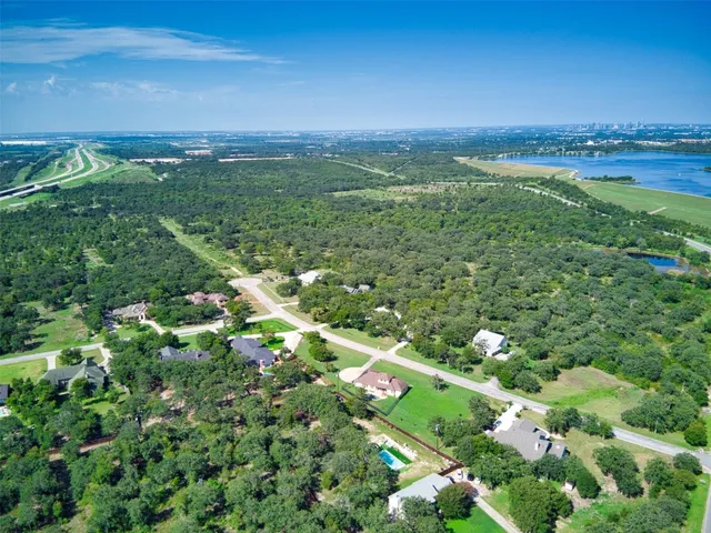 a view of a city with lots of green space