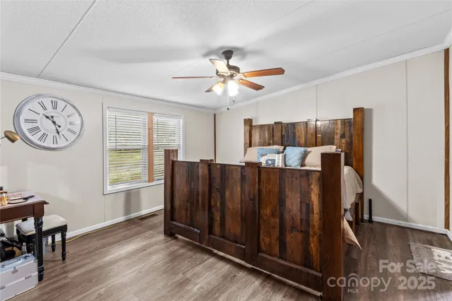 a view of a dining room with wooden floor