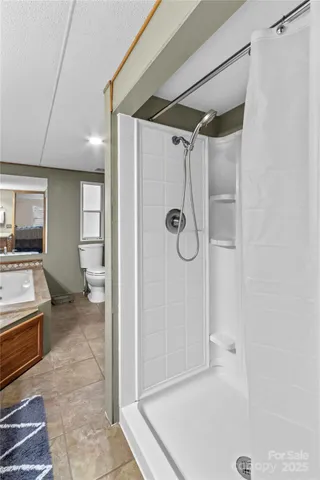 a bathroom with a tub and shower