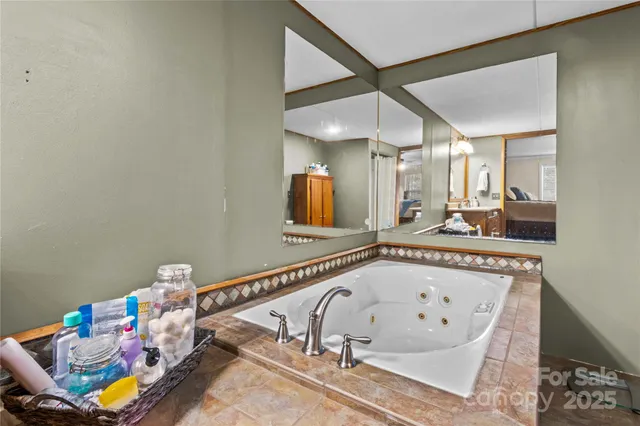 a bathroom with a bathtub and a sink