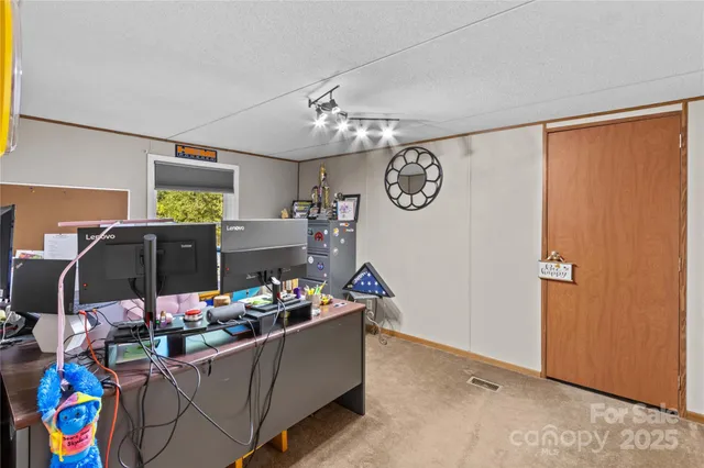 a room with storage and a clock on the wall