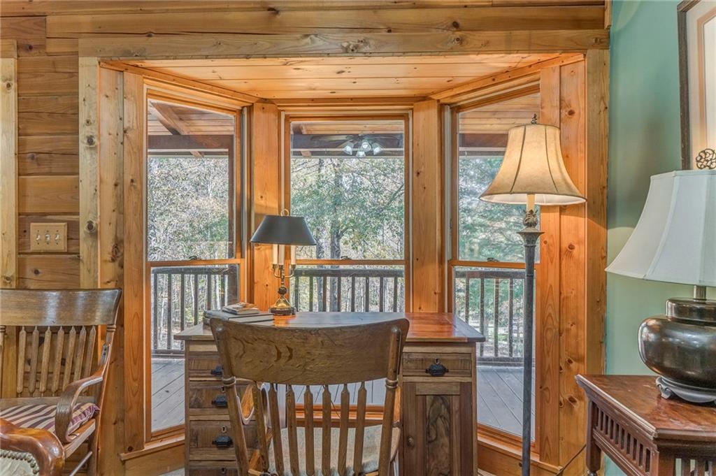 4569 Old Dalton Road Northeast Rome, GA 30165 - Photo 14 of 53 a view of a dining room with furniture window and outside view
