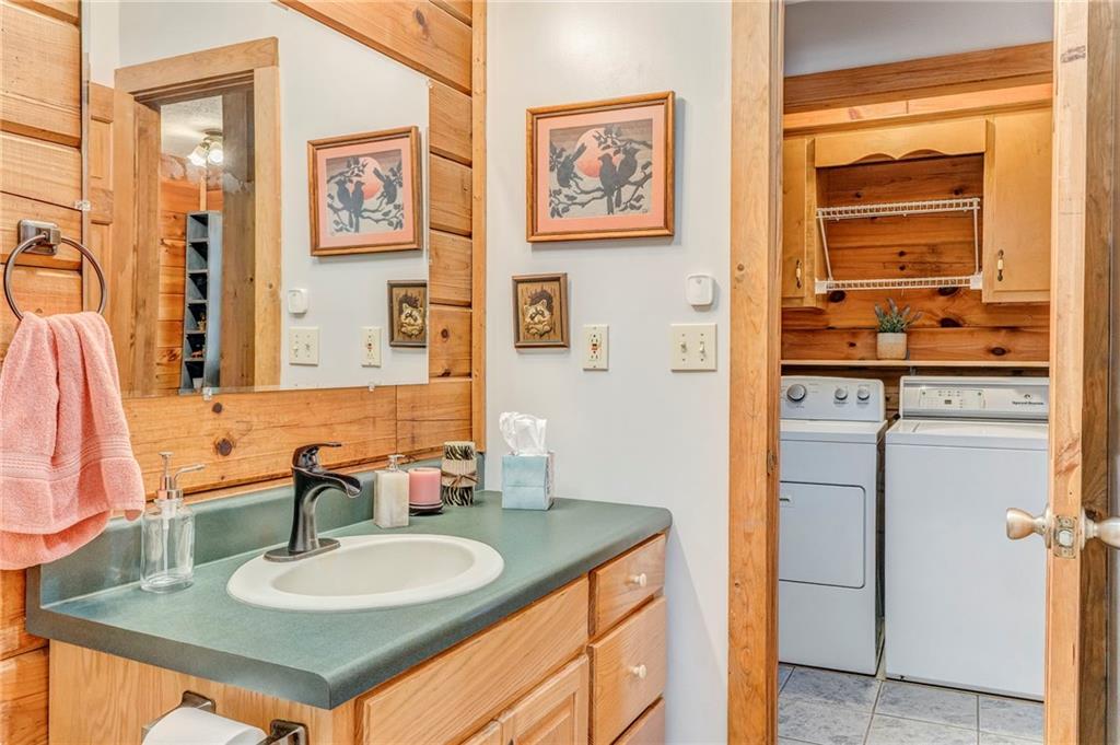 4569 Old Dalton Road Northeast Rome, GA 30165 - Photo 26 of 53 a bathroom with a sink and a mirror