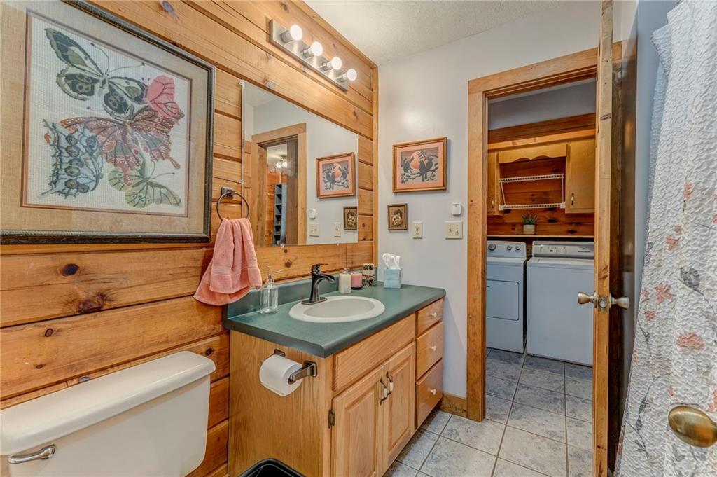 4569 Old Dalton Road Northeast Rome, GA 30165 - Photo 27 of 53 a bathroom with a sink and a mirror